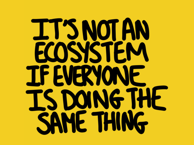 Post-it style yellow square with black writing which reads: It's not an ecosystem if everyone is doing the same thing.