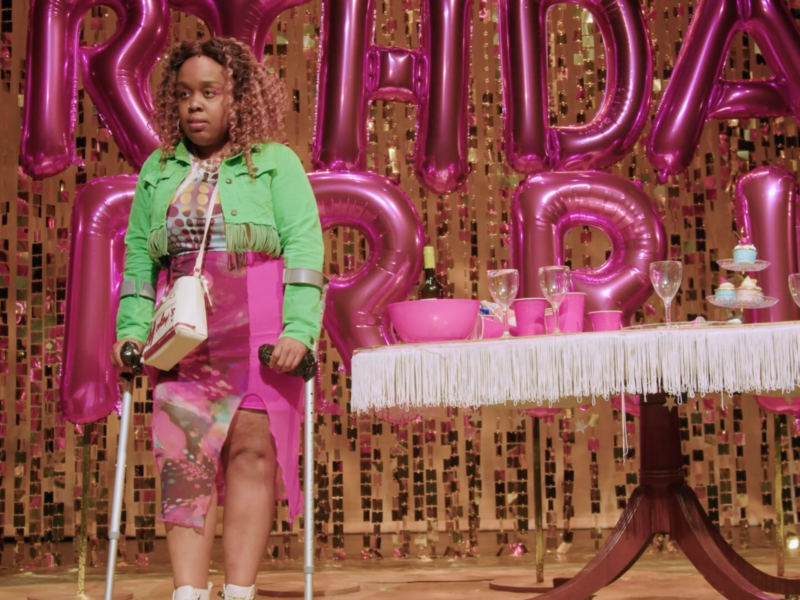 Photo of Lady from the stage show at a party by herself.