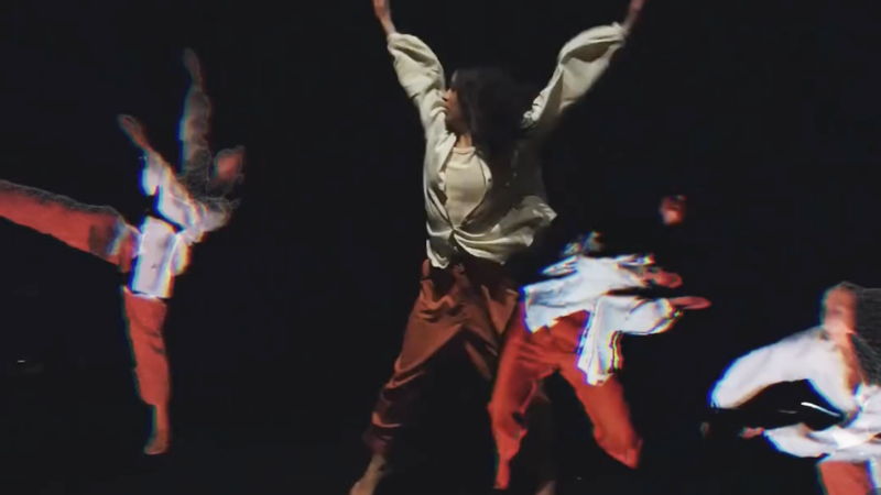 A person dances with a digital double